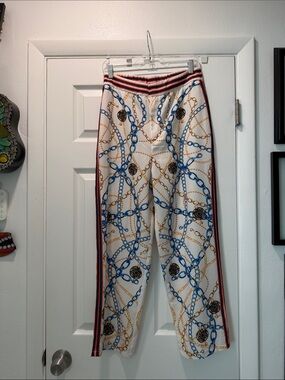 Jealous Tomato White Joggers with Blue and Gold Chain Print